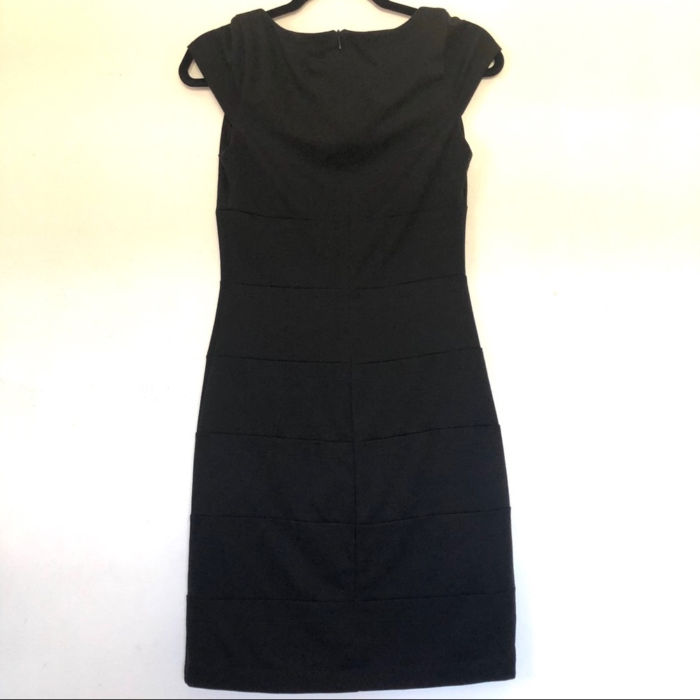 B. Darlin Black Cap Sleeve Dress.